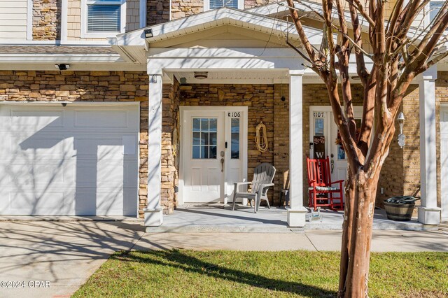 property entrance with a garage