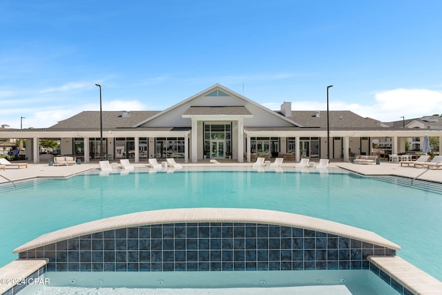 pool featuring a patio area