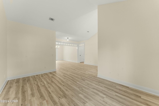 unfurnished room with light wood-type flooring