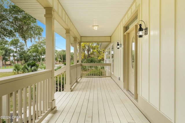 deck with covered porch