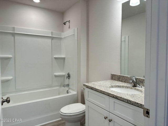 full bathroom featuring vanity, shower / bathtub combination, and toilet