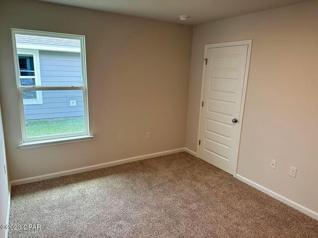 view of carpeted spare room