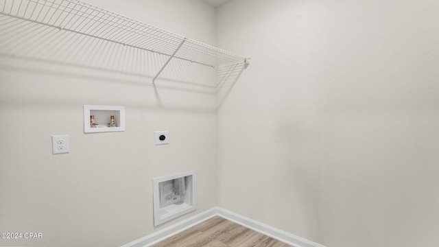 laundry room featuring hardwood / wood-style flooring, washer hookup, and hookup for an electric dryer