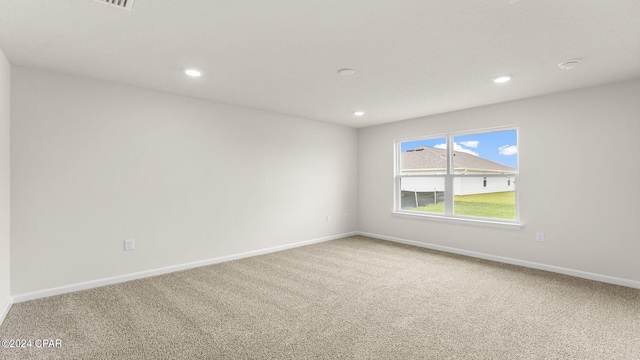 view of carpeted spare room