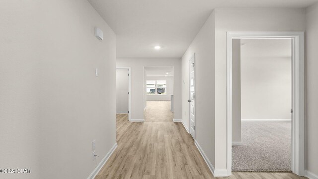 entryway with light hardwood / wood-style flooring