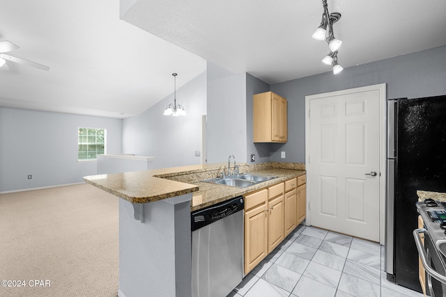 kitchen with sink, stainless steel appliances, kitchen peninsula, light carpet, and light brown cabinetry