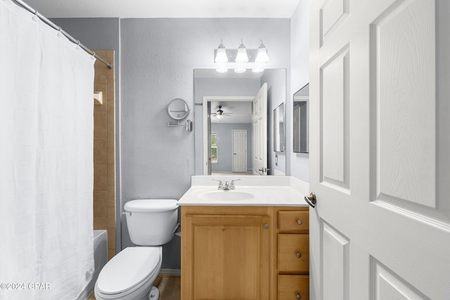 full bathroom with shower / bath combo, vanity, toilet, and ceiling fan