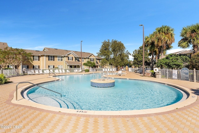 view of pool featuring a patio area