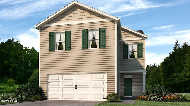 front facade featuring a garage and a front yard