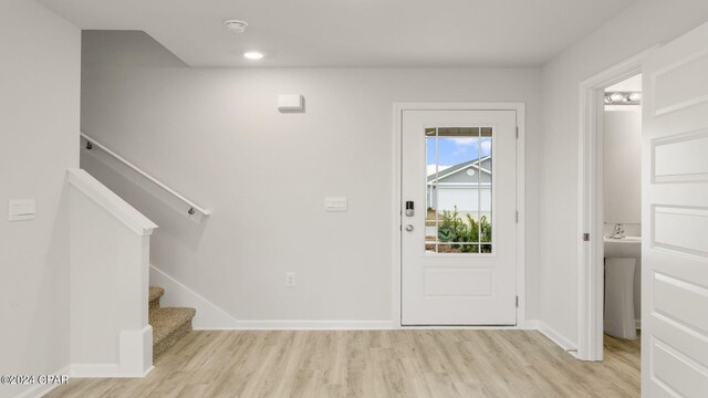 entrance foyer featuring light hardwood / wood-style flooring