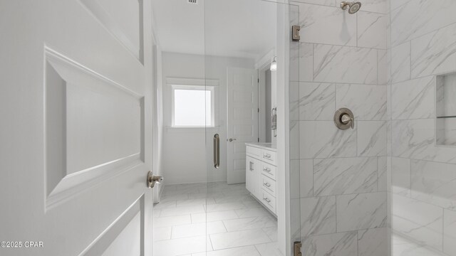 bathroom with vanity and an enclosed shower