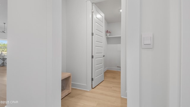 926 Crystal Bayou Blvd, Panama City Beach, FL 32407 - hallway with baseboards and light wood-type flooring