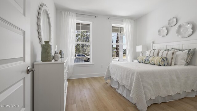 bedroom featuring light hardwood / wood-style floors