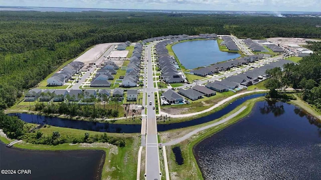 bird's eye view with a water view