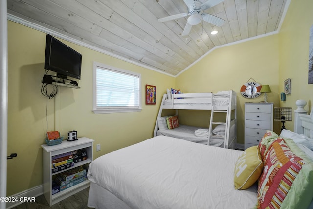 bedroom featuring lofted ceiling, hardwood / wood-style flooring, ceiling fan, ornamental molding, and wood ceiling