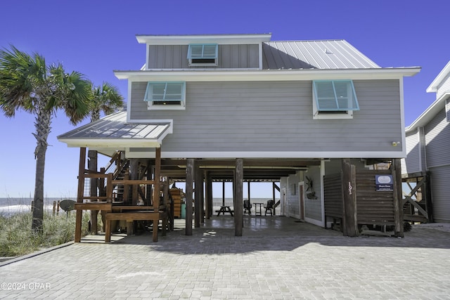 view of front of home with a carport