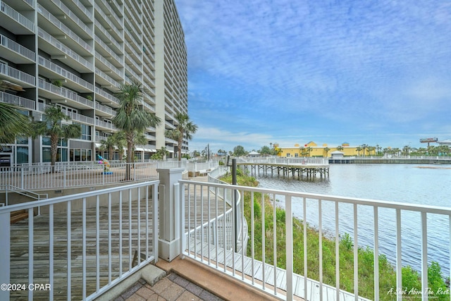 balcony featuring a water view