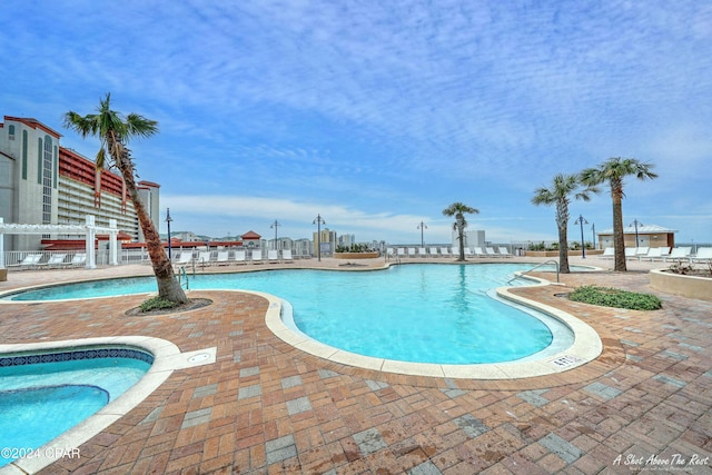 view of pool featuring a patio area