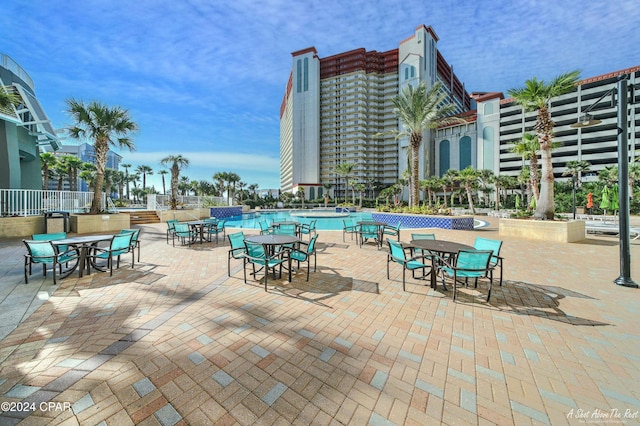 view of pool featuring a patio