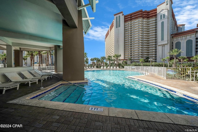 view of pool featuring a patio