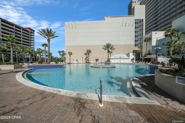 view of pool featuring a patio area