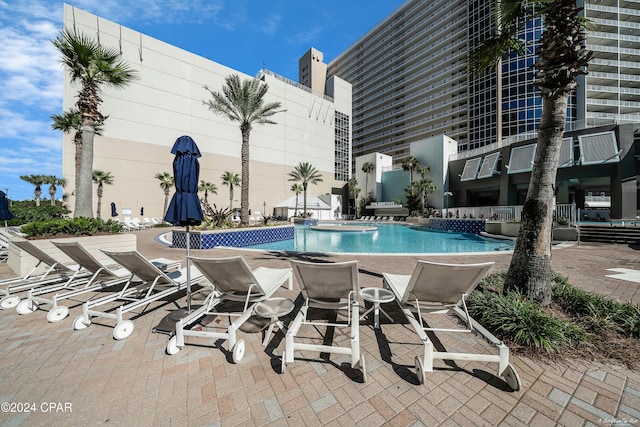 view of pool featuring a patio area