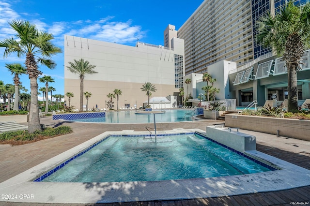 view of pool featuring a patio area