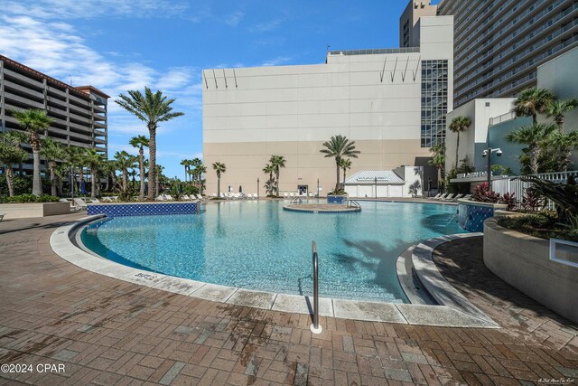 view of swimming pool featuring a patio