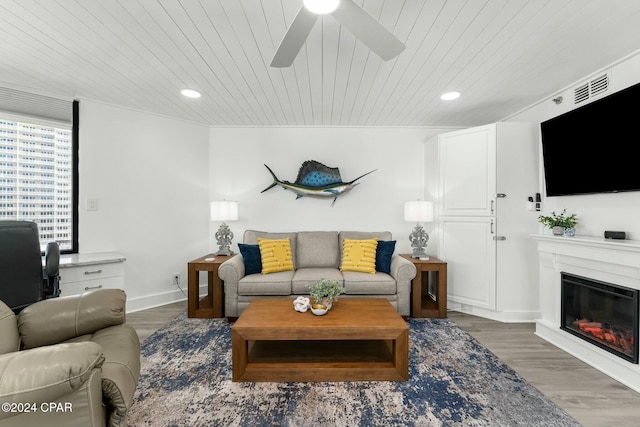 living room with wood ceiling, ceiling fan, and dark wood-type flooring