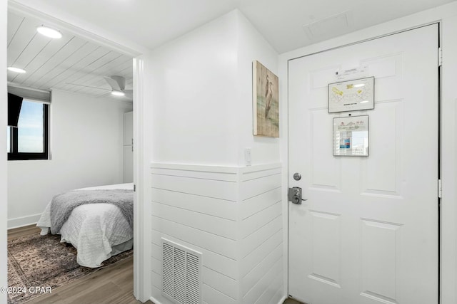 entryway with ceiling fan and light hardwood / wood-style flooring