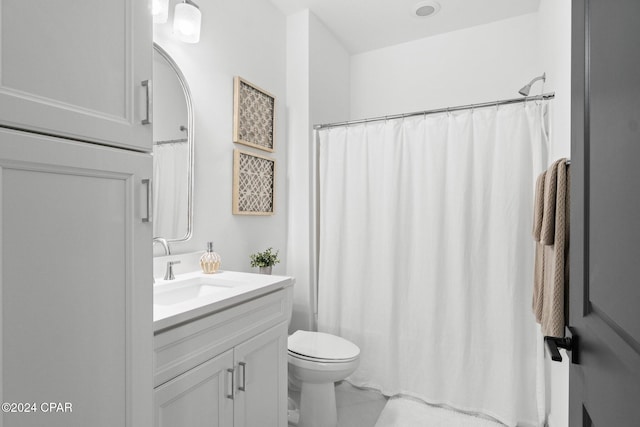 bathroom featuring tile patterned floors, vanity, toilet, and a shower with curtain