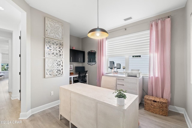 office featuring light hardwood / wood-style flooring