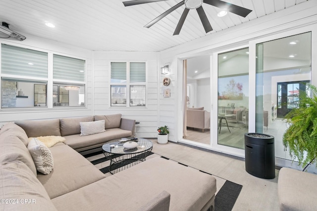 sunroom / solarium with ceiling fan