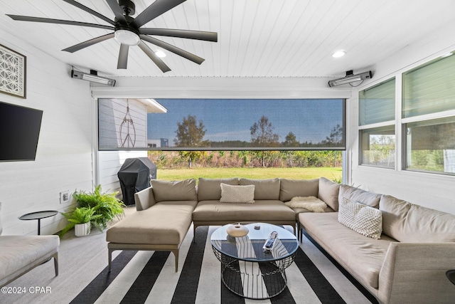 interior space featuring carpet flooring and ceiling fan