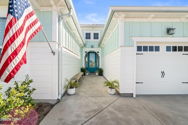 entrance to property featuring a garage