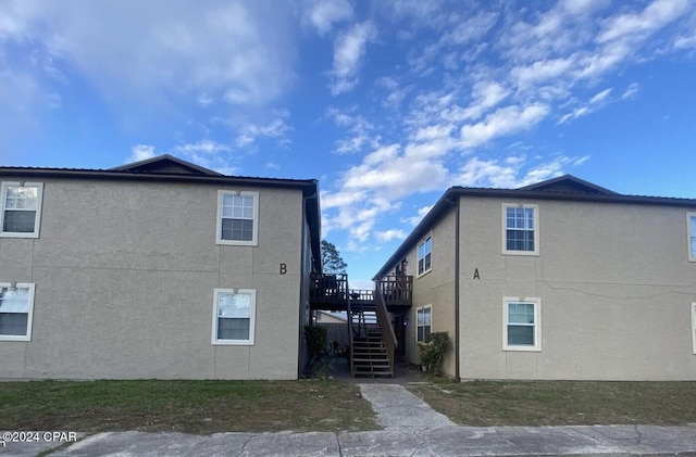 view of home's exterior with a deck