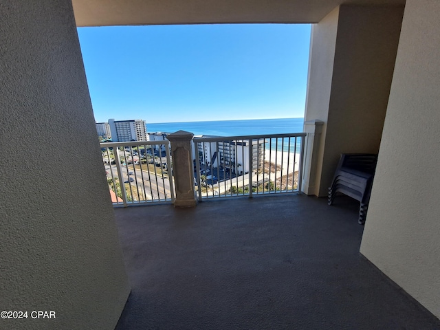 balcony featuring a water view