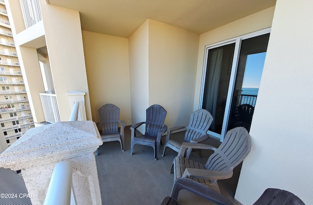 view of patio / terrace with a balcony