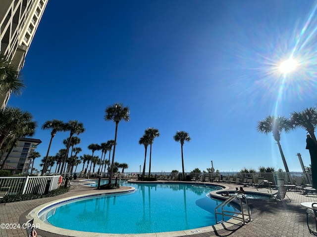 view of swimming pool featuring a patio