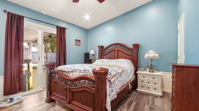 bedroom featuring hardwood / wood-style floors and ceiling fan