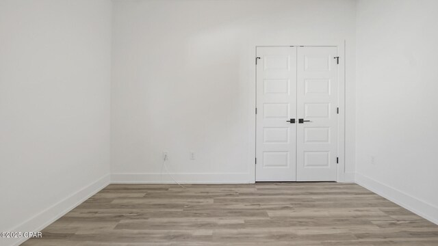 empty room featuring light wood-type flooring