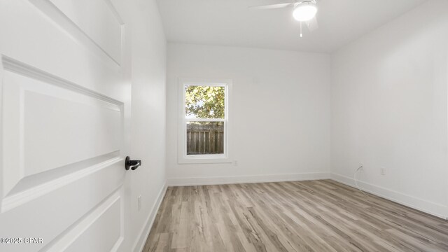 unfurnished room with light hardwood / wood-style flooring and ceiling fan