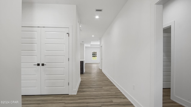 hallway featuring dark wood-type flooring