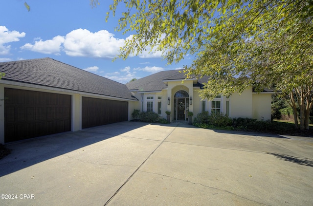 view of front of house with a garage