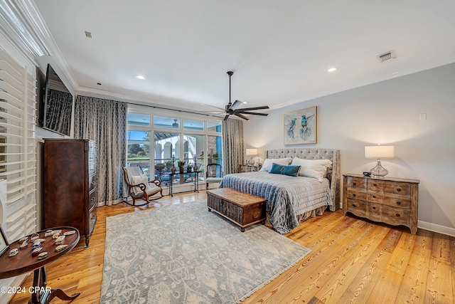 bedroom with ceiling fan, ornamental molding, and light wood-type flooring