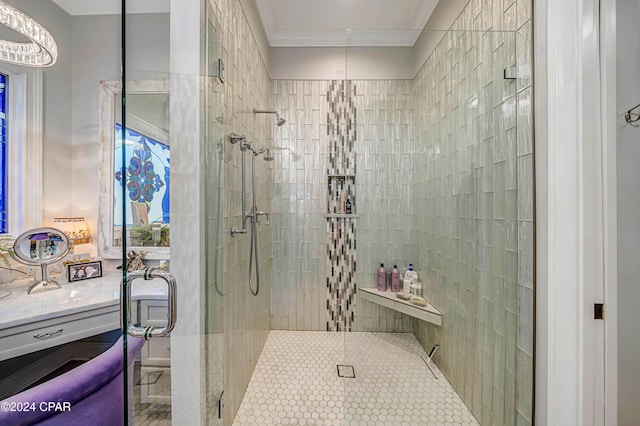 bathroom with crown molding and a shower with shower door