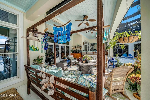 view of patio / terrace featuring ceiling fan, outdoor lounge area, and french doors