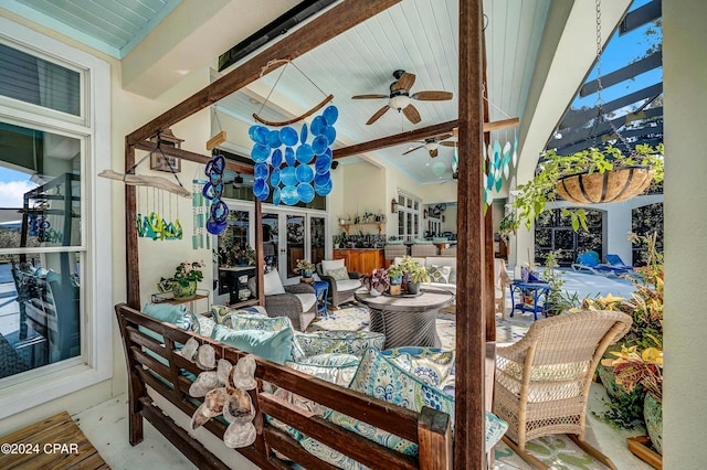 view of patio featuring french doors and ceiling fan