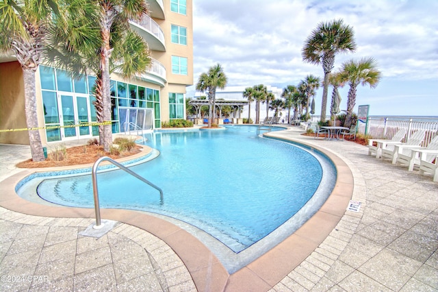 view of pool featuring a patio