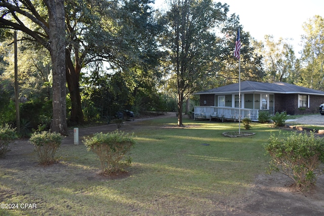 view of yard featuring a porch